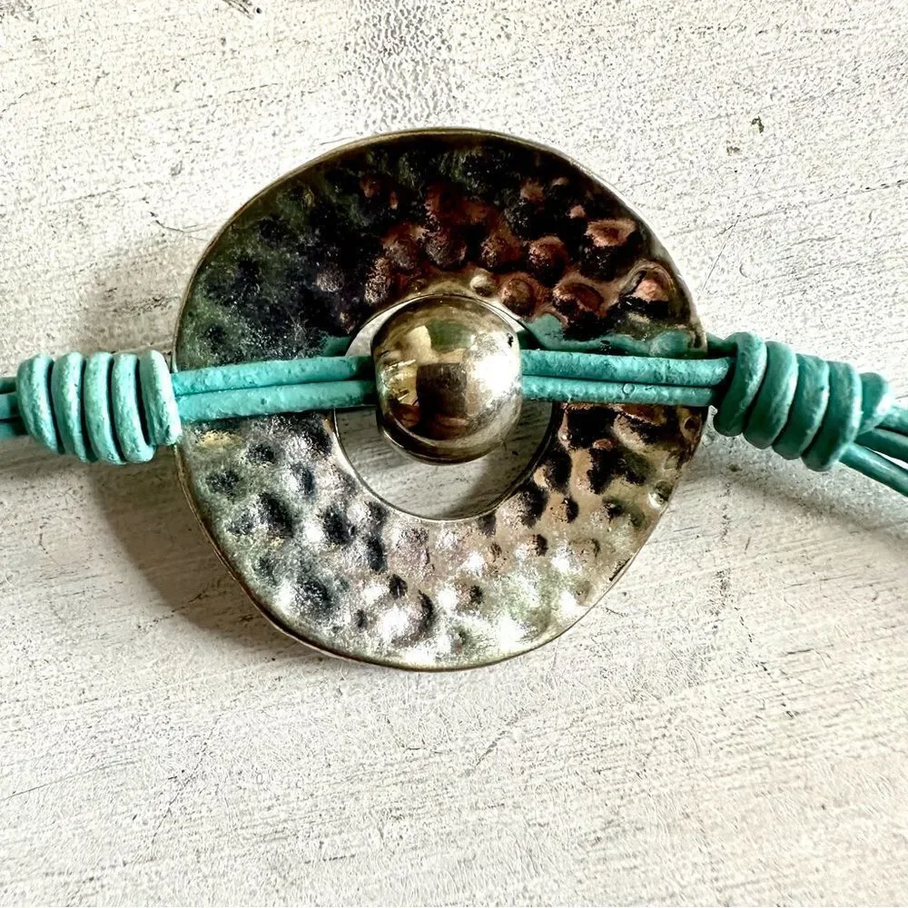 Silver tone blue cord bracelet silver tone